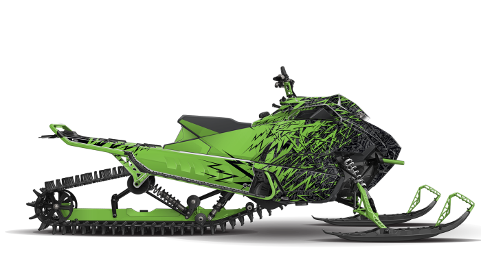 a green and black snowmobile